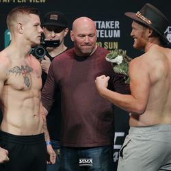 Jim Crute and Sam Alvey square off at UFC 234 weigh-ins.