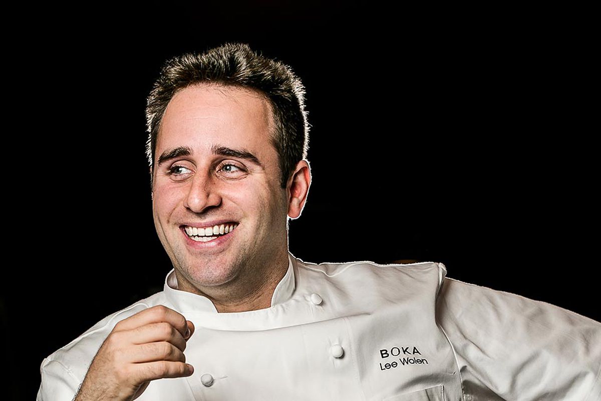 A headshot of a white male chef in a white chefs coat.