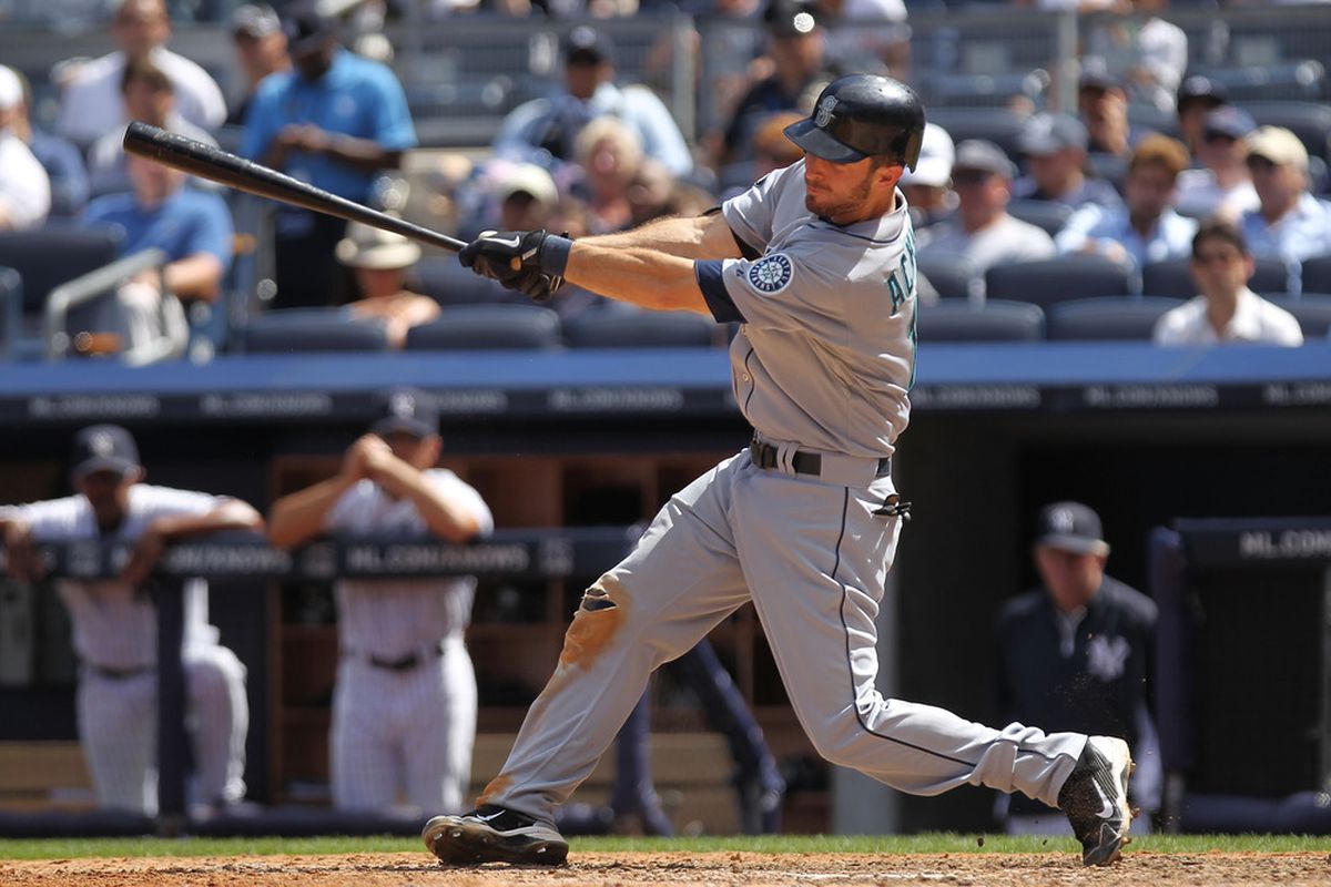 NEW YORK, NY - JULY 27: Dustin Ackley #13 of the Seattle Mariners hits a ground out RBI in the seventh inning against the New York Yankees on July 27, 2011 at Yankee Stadium in the Bronx borough of New York City.  (Photo by Nick Laham/Getty Images)
