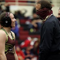 Donna Wright of Maple Mountain talks in between competition at the 5A/3A/2A/1A girls wrestling state championship meet at Mountain View High School in Orem on Wednesday, Feb. 17, 2021.