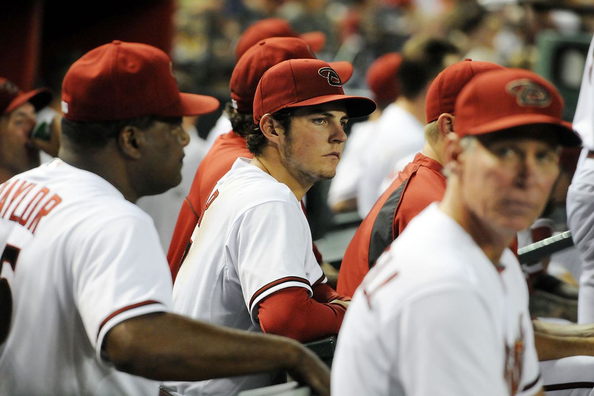 PHOENIX, AZ - JULY 03:  Trevor Bauer #17 of the Arizona Diamondbacks looks on from the bench after being pulled from the game against the San Diego Padres at Chase Field on July 3, 2012 in Phoenix, Arizona.  (Photo by Norm Hall/Getty Images)