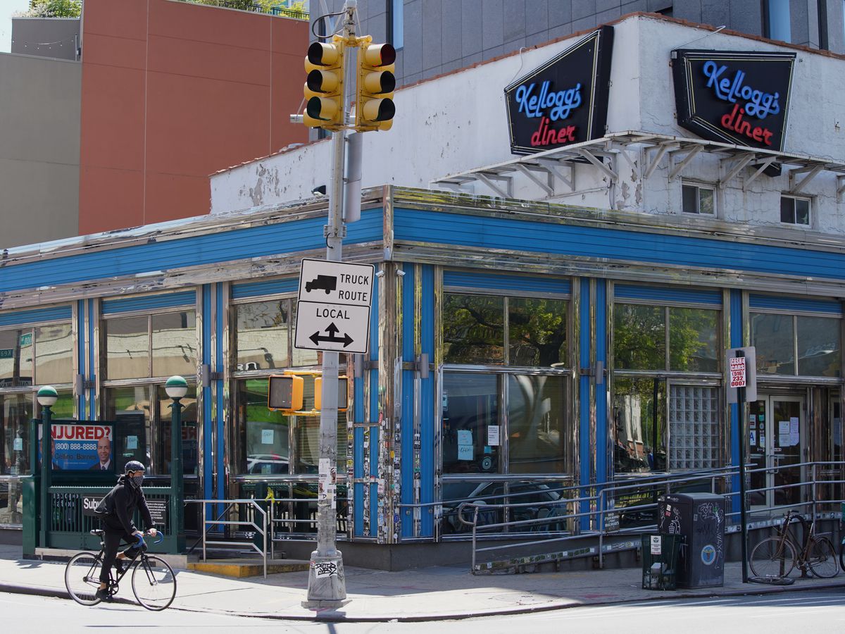 A person bikes by Kellogg’s Diner in the Williamsburg neighborhood of Brooklyn during the coronavirus pandemic on May 7, 2020 in New York City.&nbsp;