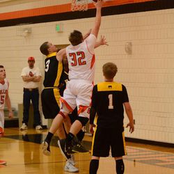 Valley's Justin Millard goes up for a layup in the Buffaloes' 57-52 win over Diamond Ranch on Feb. 4, 2015.