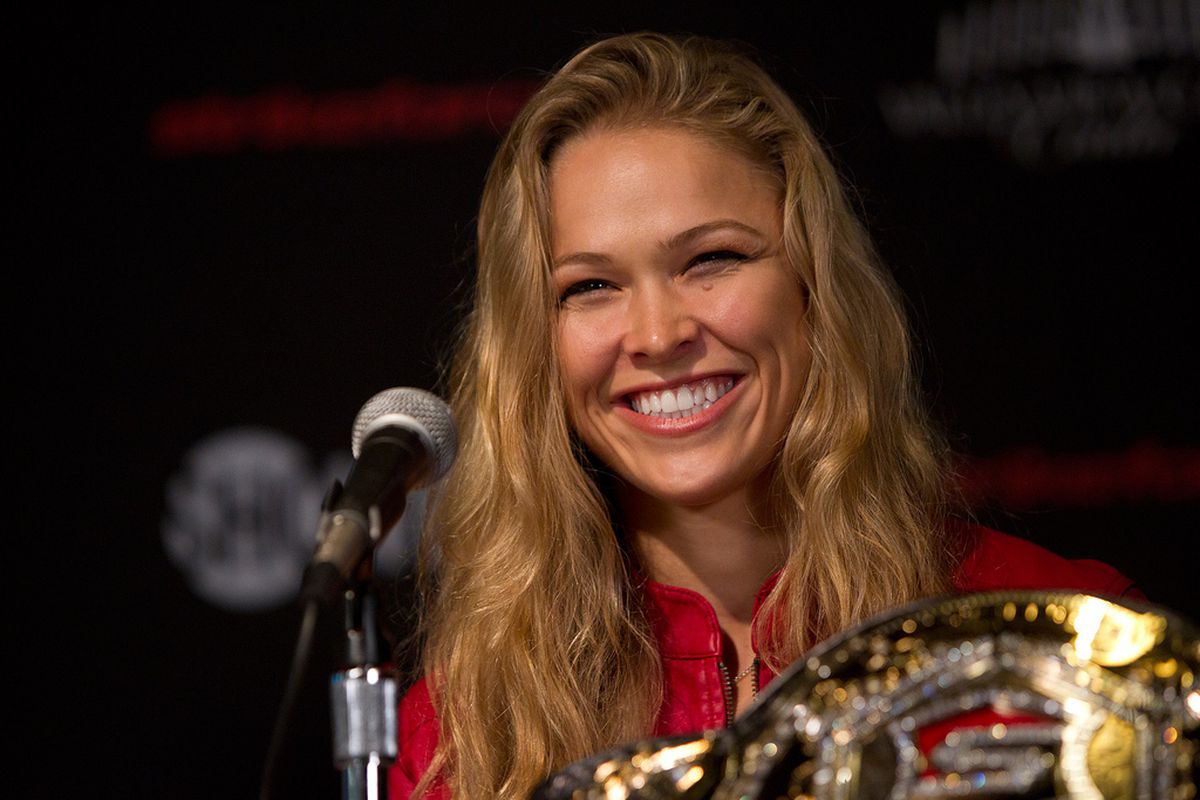 Is this the smile of a cage killer? Photo of Strikeforce champion Ronda Rousey by Esther Lin for SHO Sports via <a href="http://farm9.staticflickr.com/8434/7798092088_8fde1a4838_b.jpg">Flickr.com</a>.