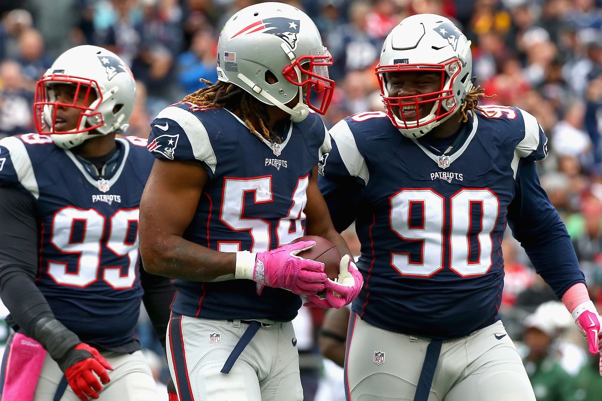Dominique Easley and Malcom Brown flank Dont'a Hightower, who is having a monster year