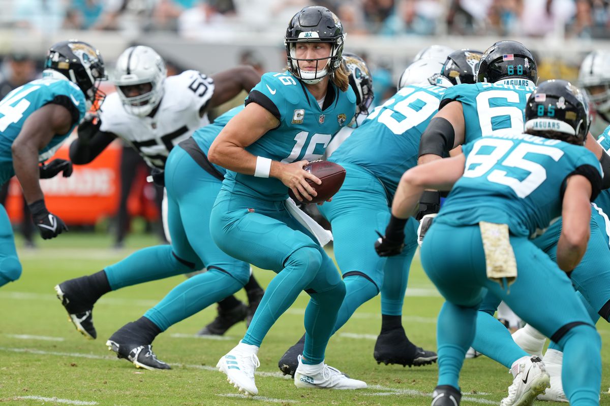 Trevor Lawrence #16 of the Jacksonville Jaguars drops back to hand off the ball in the second quarter of the game against the Las Vegas Raiders at TIAA Bank Field on November 06, 2022 in Jacksonville, Florida.
