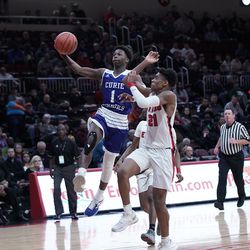 Curie’s Elijah Pickens (1) races Rockford East’s Sincere Parker (21) to the basket in the 4A 3rd place game at Peoria Civic Center in Peoria IL, Saturday 03-16-19. Worsom Robinson/For the Sun-Times
