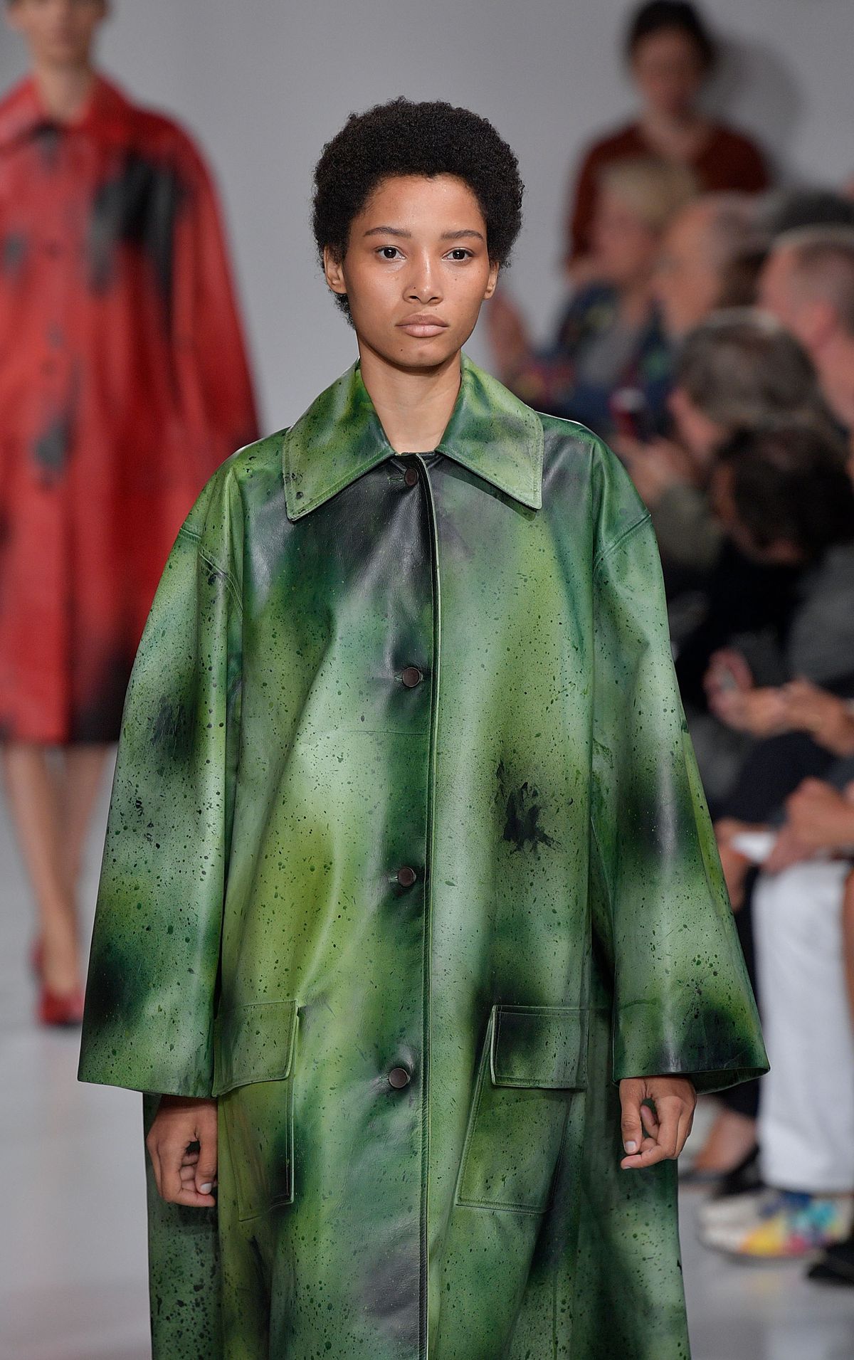 A green coat at Calvin Klein