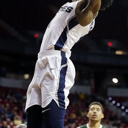 Utah State Aggies guard Koby McEwen dunks the ball against the Colorado State Rams during the Mountain West Conference basketball tournament in Las Vegas on Wednesday, March 7, 2018.