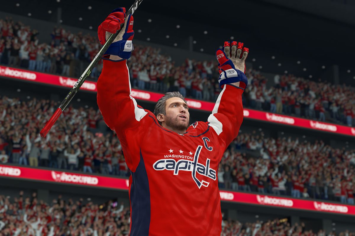 a helmetless Alex Ovechkin raises his arms in celebration in NHL 21