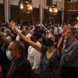 Hundreds attend as Father Michael Pfleger celebrates Mass for the first time since January after he was reinstated as senior pastor of the Faith Community of Saint Sabina in Auburn Gresham, Sunday, June 6, 2021. The Archdiocese of Chicago cleared Pfleger to return to the South Side church after an internal probe into decades-old allegations of sexual abuse against minors.