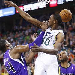 Utah Jazz small forward Jeremy Evans (40) fights for the ball with Sacramento Kings power forward Jason Thompson (34) during NBA action in Salt Lake City Saturday, Dec. 7, 2013. The Kings won 112-102.