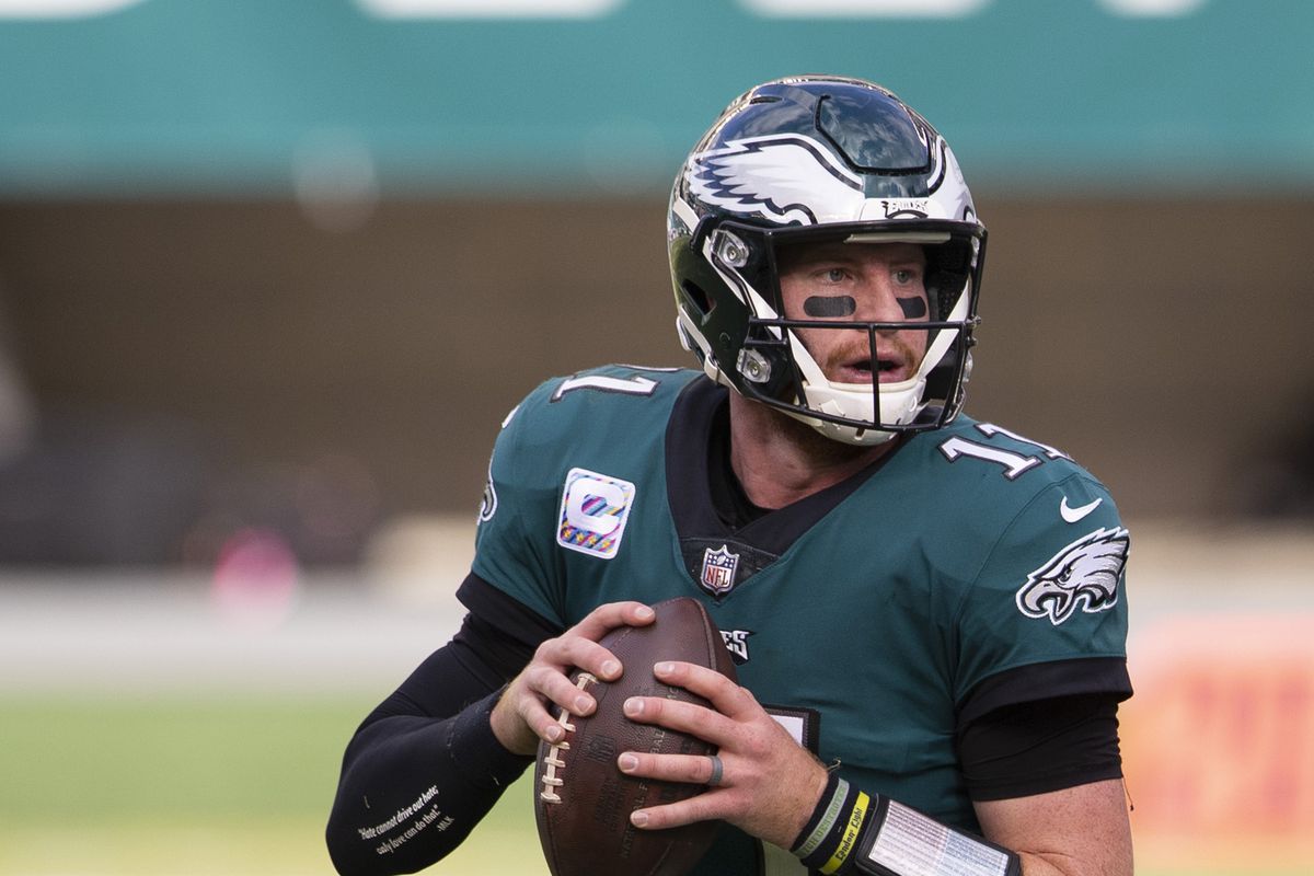 Carson Wentz of the Philadelphia Eagles looks to pass the ball against the Baltimore Ravens at Lincoln Financial Field on October 18, 2020 in Philadelphia, Pennsylvania.
