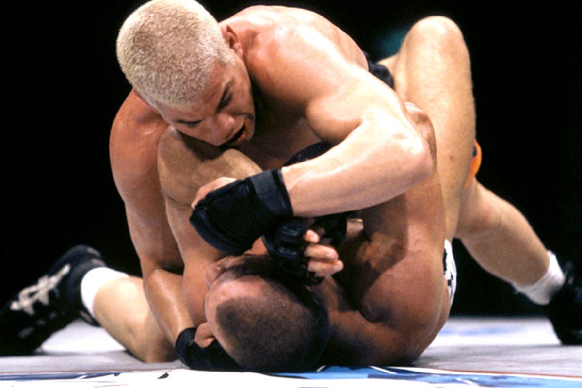 Tito Ortiz (top) drops a few elbows on Wanderlei Silva at UFC 25 in Japan. Photo via <a href="http://a.espncdn.com/photo/2011/0906/mma_g_ortiz_silva1x_600.jpg">ESPN.com</a>.