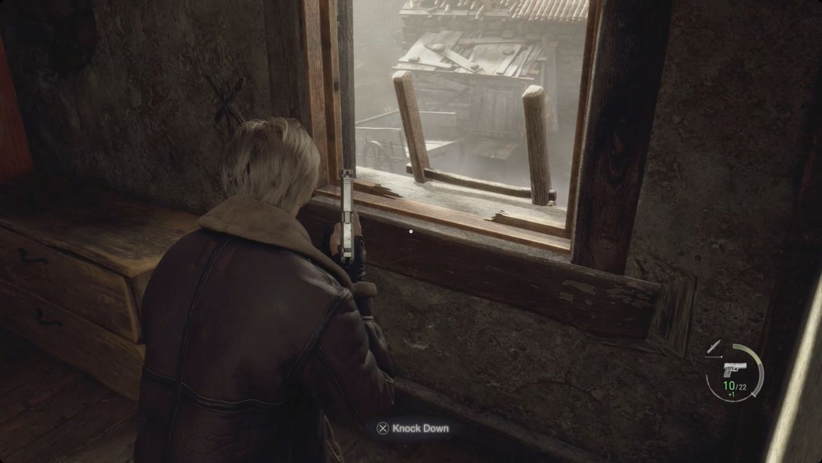 Resident Evil 4&nbsp;remake&nbsp;Leon knocking a ladder away from an upstairs window