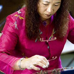 Fei Yaoli plays zheng, or zither, at the U. Tuesday.