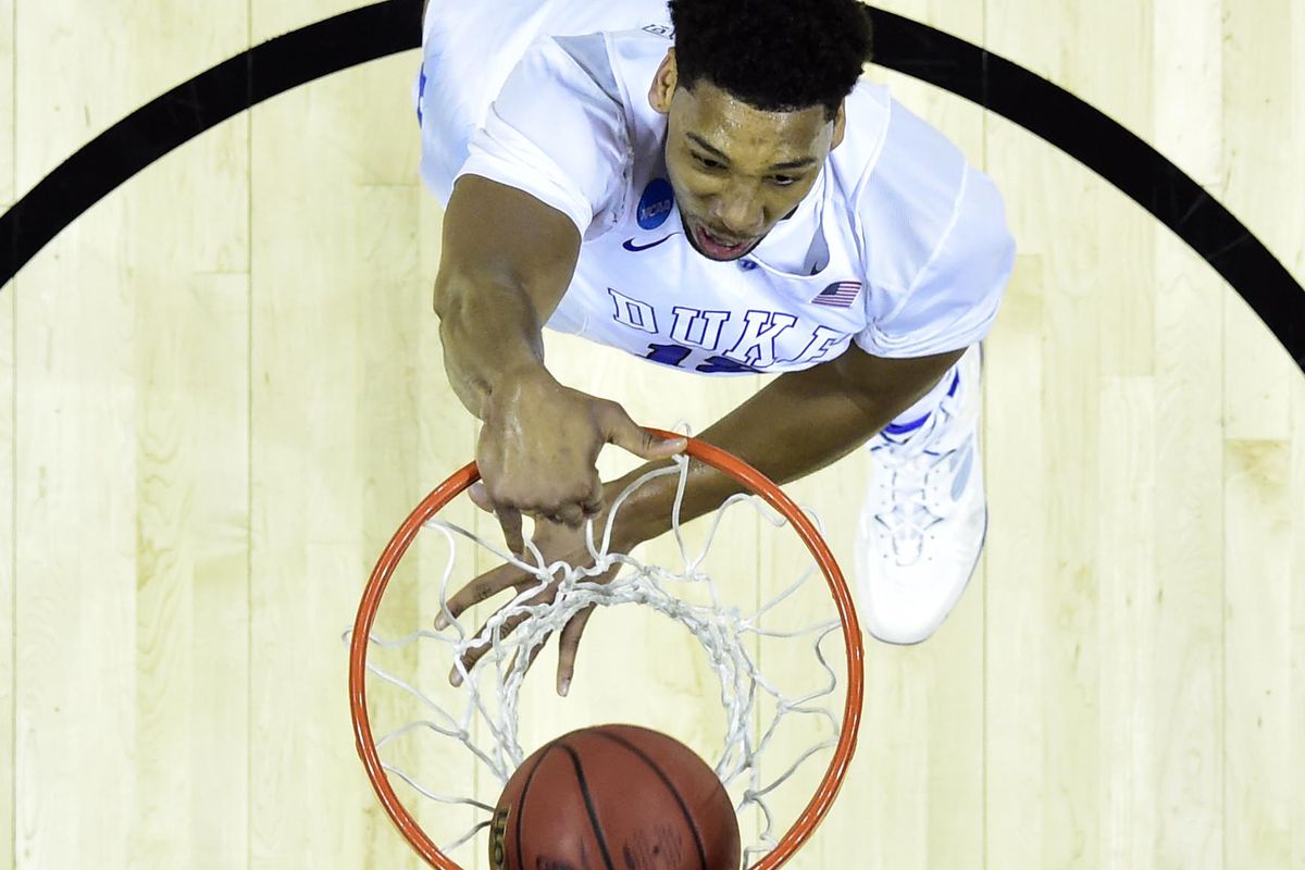 Mar 22, 2015; Charlotte, NC, USA; Duke Blue Devils center Jahlil Okafor (15) dunks the ball during the first half against the San Diego State Aztecs in the third round of the 2015 NCAA Tournament at Time Warner Cable Arena