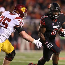 Utah running back Zack Moss heads up field during game against USC in 2016.