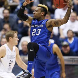 Creighton Bluejays guard James Milliken (23) grabs a high pass as BYU and Creighton play in NIT quarterfinal action at the Marriott Center in Provo Tuesday, March 22, 2016.