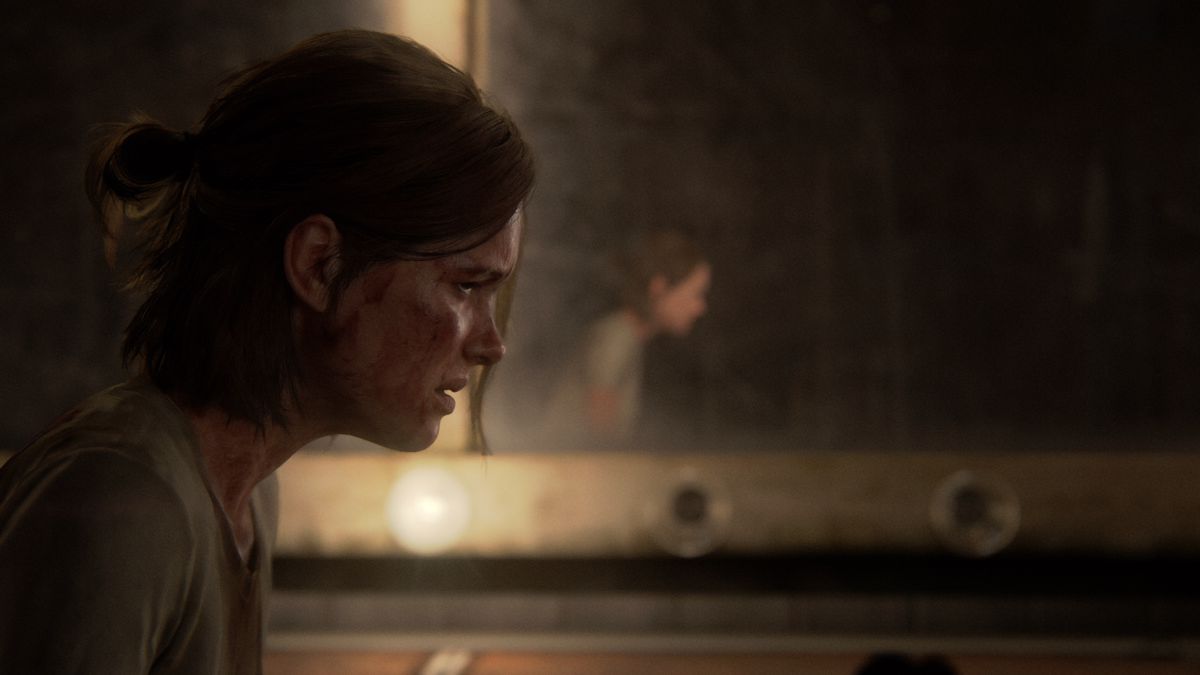 A bloodied and tired Ellie looks off-camera in The Last of Us Part 2