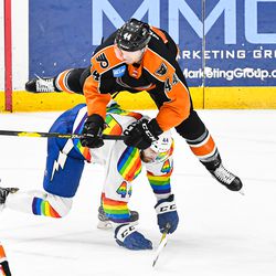 Syracuse Crunch Anthony Greco (44) upends Lehigh Valley Phantoms Reece Willcox (44) in American Hockey League (AHL) action at the Upstate Medical University Arena in Syracuse, New York on Saturday, February 22, 2020. Syracuse won 2-1.