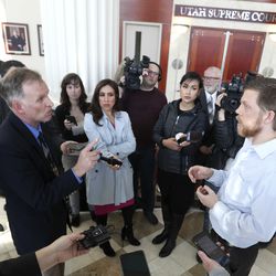 Connor Boyack, president of Libertas Institute, right, talks with Steve Maxfield, of Konosh, left, outside the Utah Supreme Court following oral arguments on Monday, March 25, 2019. Maxfield and several dozen Utahns have petitioned the court to overturn the medical marijuana law that state lawmakers passed in December and restore Proposition 2 as approved by voters in November.