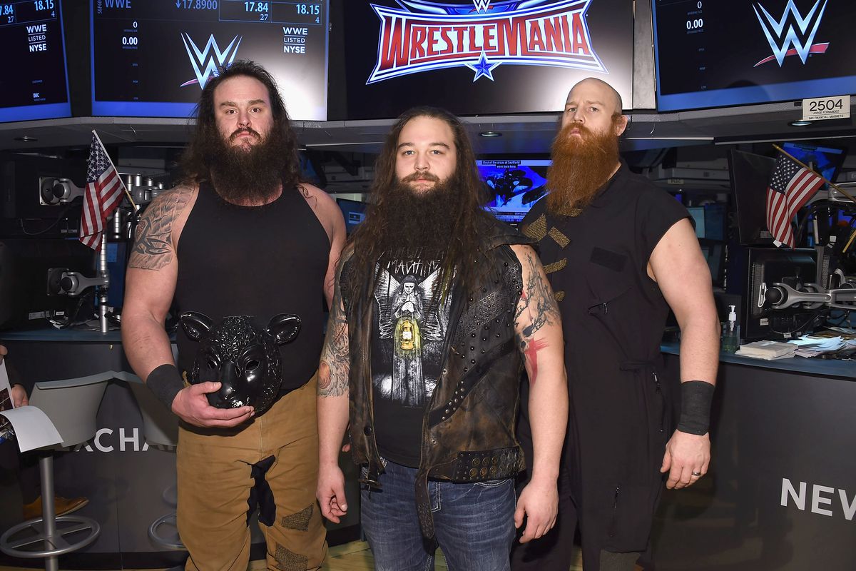 WWE wrestlers Braun Strowman, Bray Wyatt and Erick Rowan pose for a picture prior to ringing the New York Stock Exchange bell