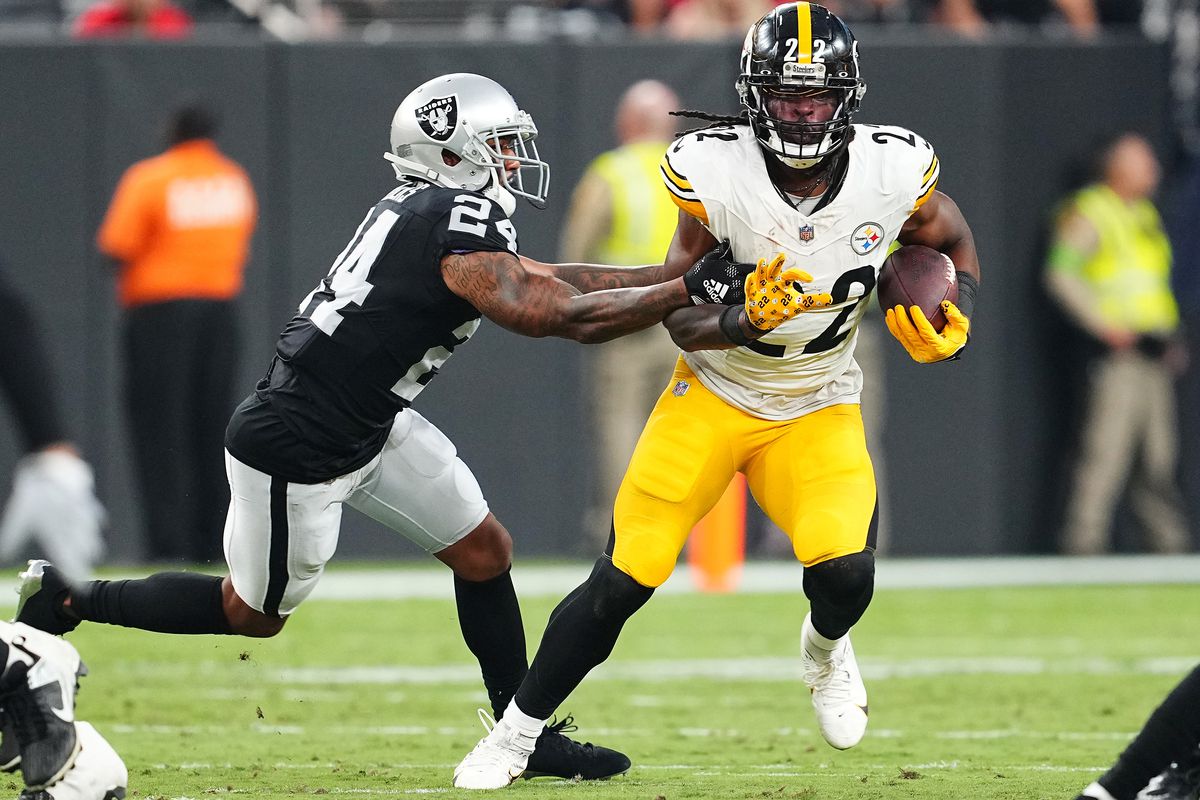 Najee Harris #22 of the Pittsburgh Steelers runs while chased by \ra24 during the first quarter at Allegiant Stadium on September 24, 2023 in Las Vegas, Nevada.