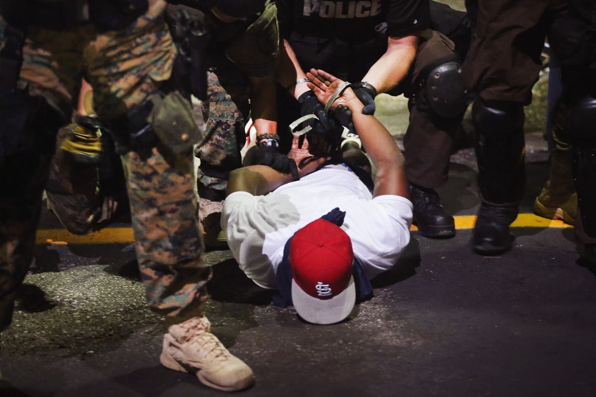 Police arrest a protester in Ferguson, Missouri.