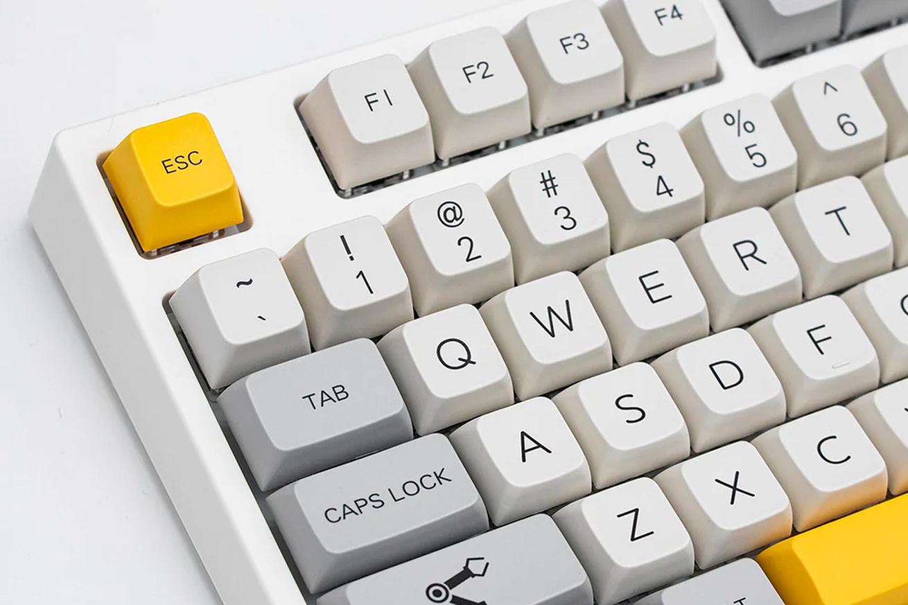A close-up shot of Epomaker’s TH80 Pro keyboard with gray and yellow keycaps.
