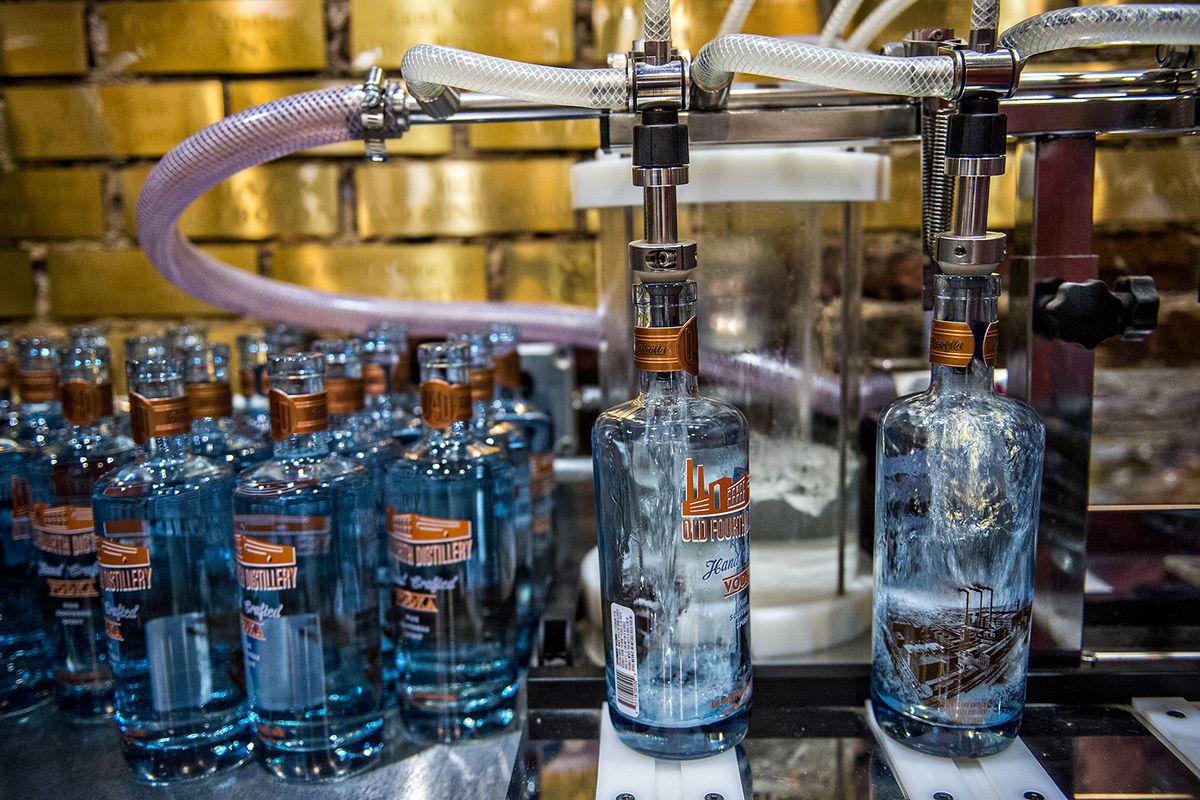 Vodka bottles being filled at Old 4th Distillery.