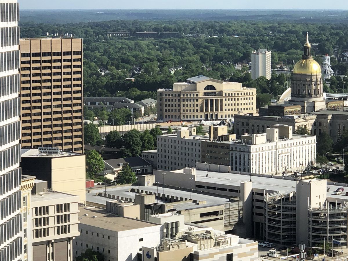A view from far away, in downtown, shows how the new judicial building compliments the architecture of the statehouse.