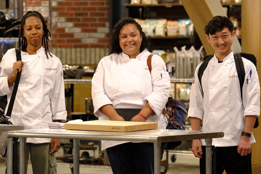 Chef Evelyn García smiling alongside her fellow “Top Chef” contestants.