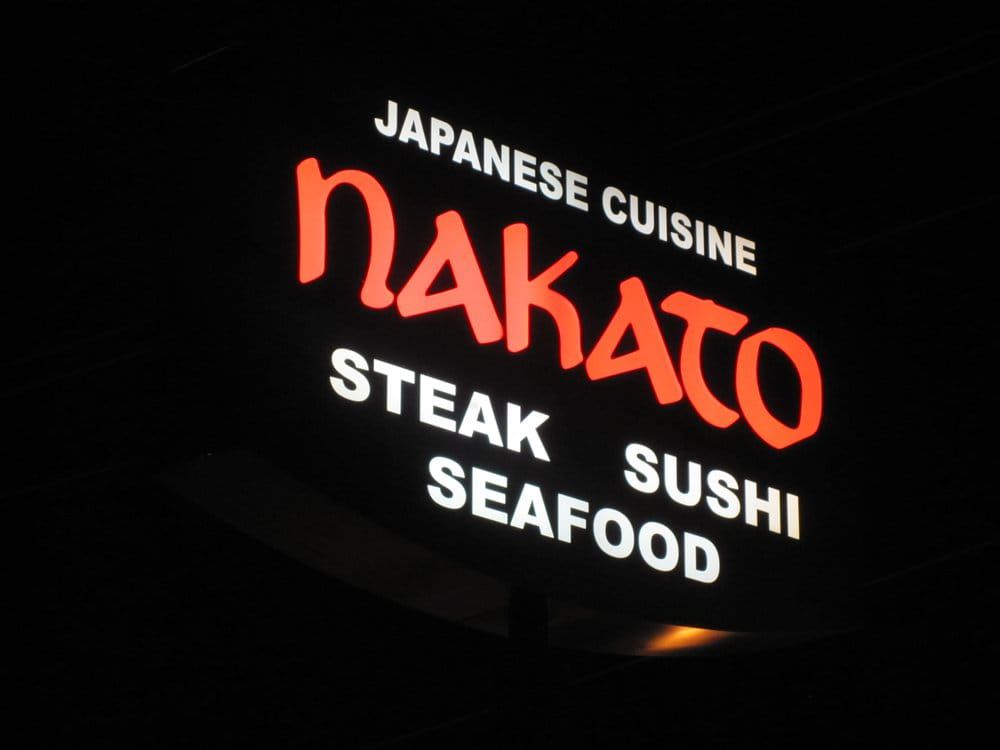 The Nakato Japanese restaurant sign lit up in the dark in Atlanta