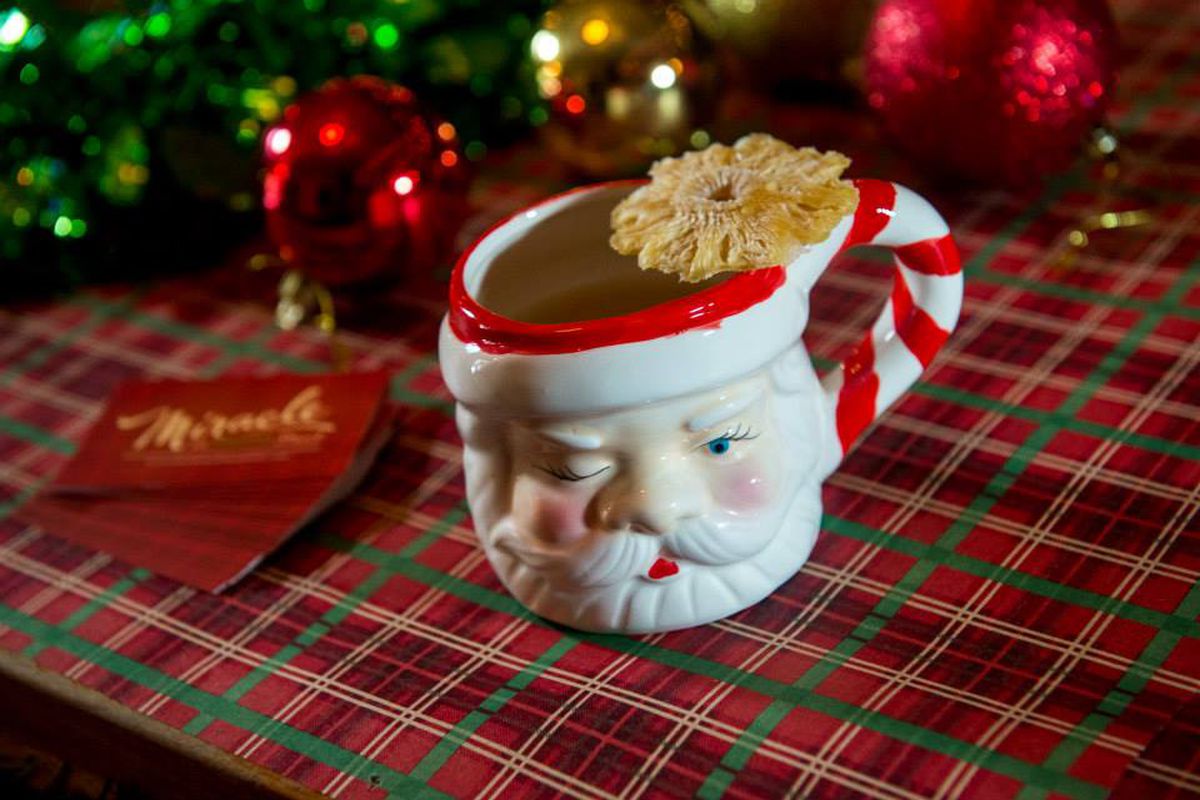 A santa-faced mug. 