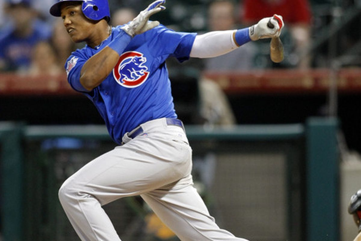 Houston, TX, USA; Chicago Cubs shortstop Starlin Castro hits a single against the Houston Astros at Minute Maid Park. The Astros defeated the Cubs 8-4. Credit: Brett Davis-US PRESSWIRE