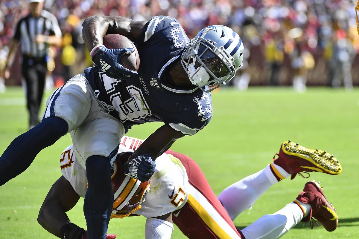 Dallas Cowboys wide receiver Michael Gallup is tackled by Washington linebacker Shaun Dion Hamilton during the second half at FedExField.