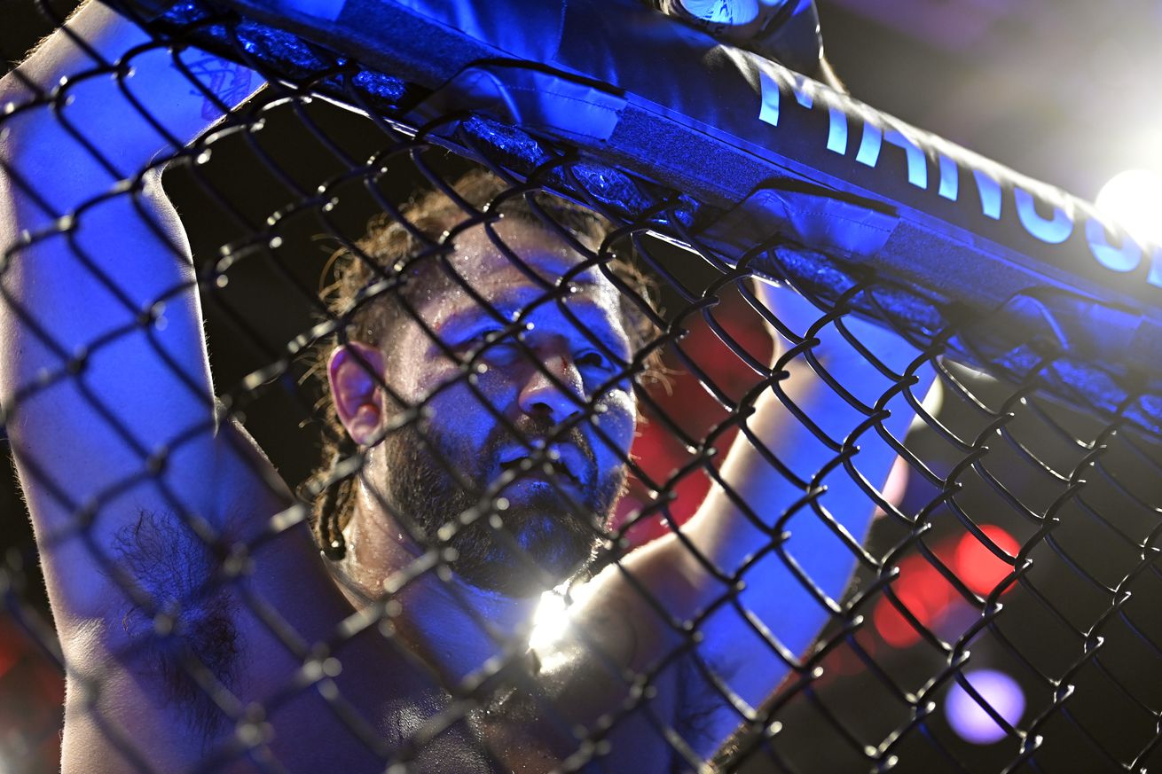 Jorge Masvidal stares through the cage at UFC 272.