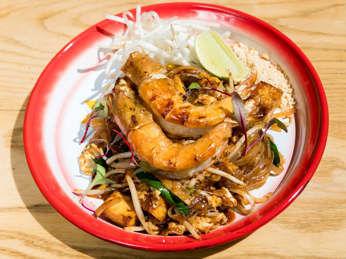 A plate of pad Thai with two shrimps on top, from Funky Elephant.