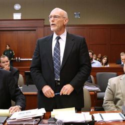 Defense attorney Don West, center, addresses the court as defense attorney Mark O'Mara, left, and defendant George Zimmerman listen, in Seminole circuit court during a pretrial hearing, in Sanford, Fla., Saturday, June 8, 2013. Zimmerman has been charged with second-degree murder for the 2012 shooting death of Trayvon Martin.