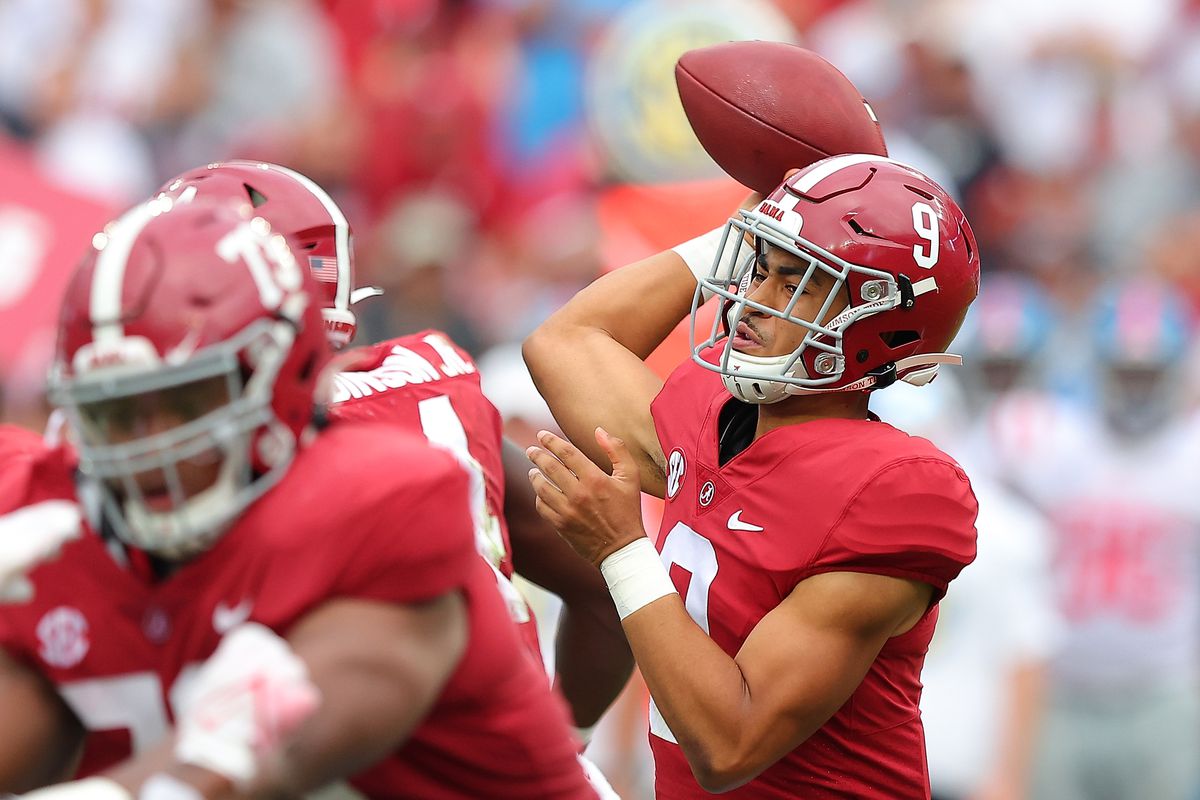 Bryce Young of the Alabama Crimson Tide looks to pass against the Mississippi Rebels during the second half at Bryant-Denny Stadium on October 02, 2021 in Tuscaloosa, Alabama.