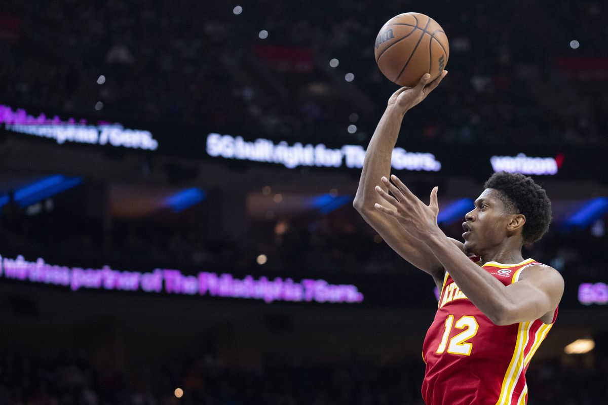 De’Andre Hunter #12 of the Atlanta Hawks shoots the ball against the Philadelphia 76ers in the second half at the Wells Fargo Center on October 30, 2021 in Philadelphia, Pennsylvania. The 76ers defeated the Hawks 122-94.