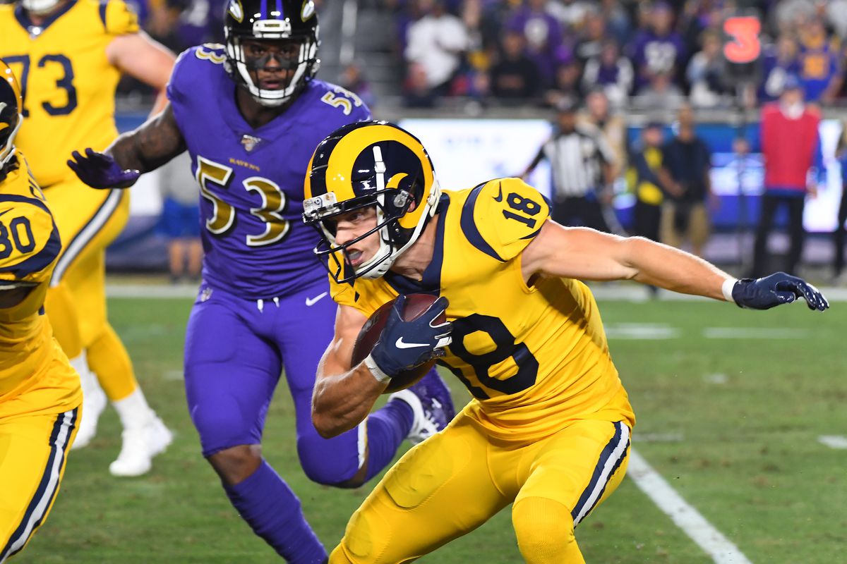 Cooper Kupp of the Los Angeles Rams is stopped short of a first down in the first quarter of the game against the Baltimore Ravens at the Los Angeles Memorial Coliseum on November 25, 2019 in Los Angeles, California.