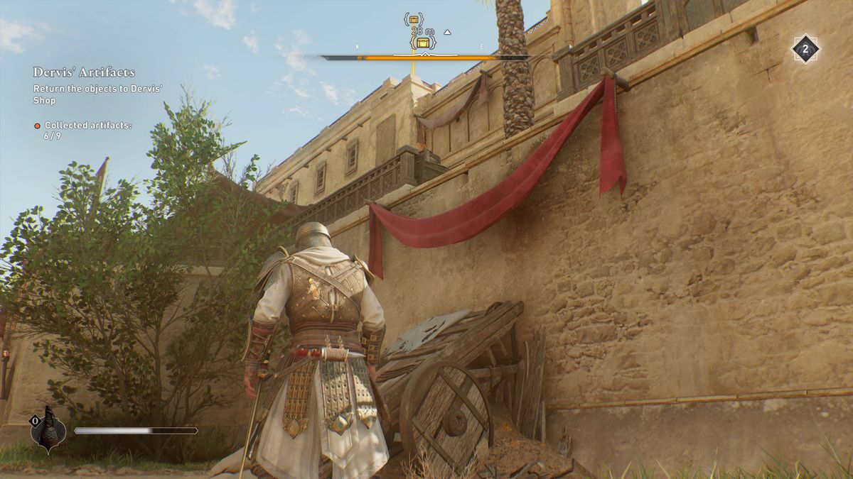 Basim stands by a rampart with a red banner and a gear chest location in AC Mirage.