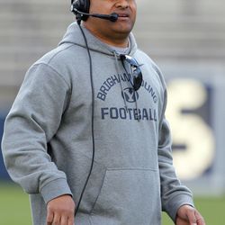 Brigham Young Cougars head coach Kalani Sitake watches his team play a spring football scrimmage at LaVell Edwards Stadium in Provo, Saturday, March 26, 2016.