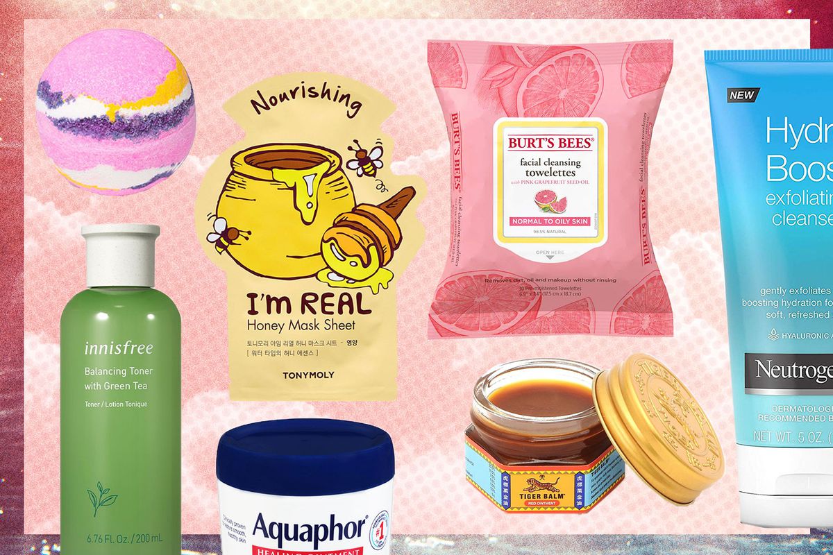 An array of products on a pink collage backdrop:  a bath bomb, jar of Aquaphor, Tiger Balm, green bottle of Innisfree toner, a yellow face mask package, a pink package of facial wipes, and a blue bottle of Hydro-Boost Neutrogina cleanser