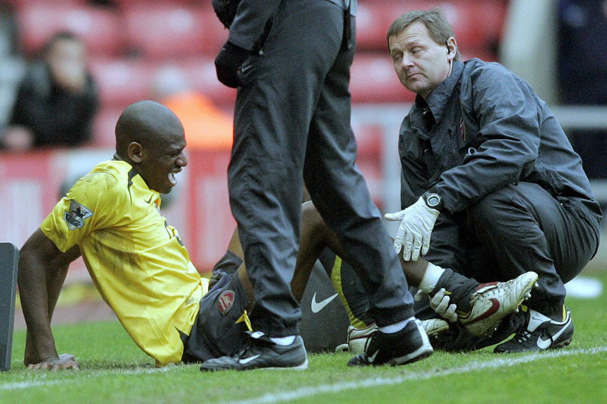 Diaby receives treatment after Smith's tackle.