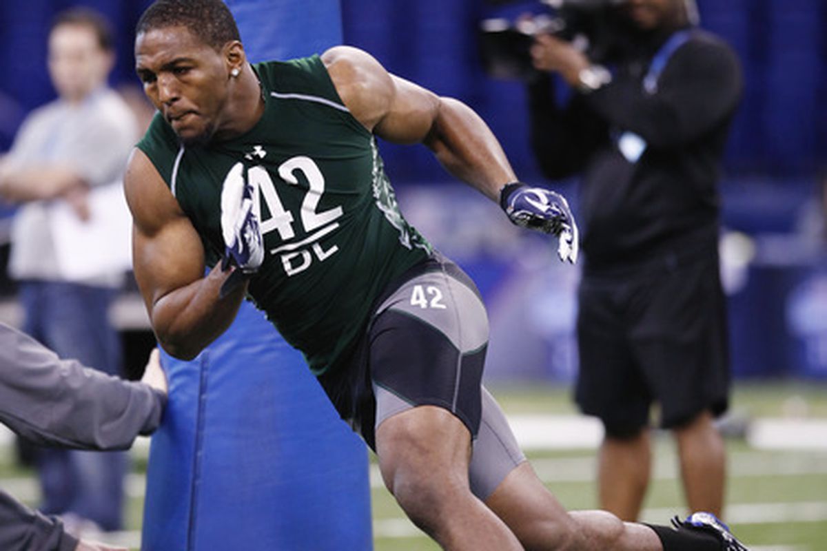 INDIANAPOLIS, IN - FEBRUARY 28:  Defensive lineman Robert Quinn of North Carolina runs through a drill during the 2011 NFL Scouting Combine at Lucas Oil Stadium on February 28, 2011 in Indianapolis, Indiana. (Photo by Joe Robbins/Getty Images)