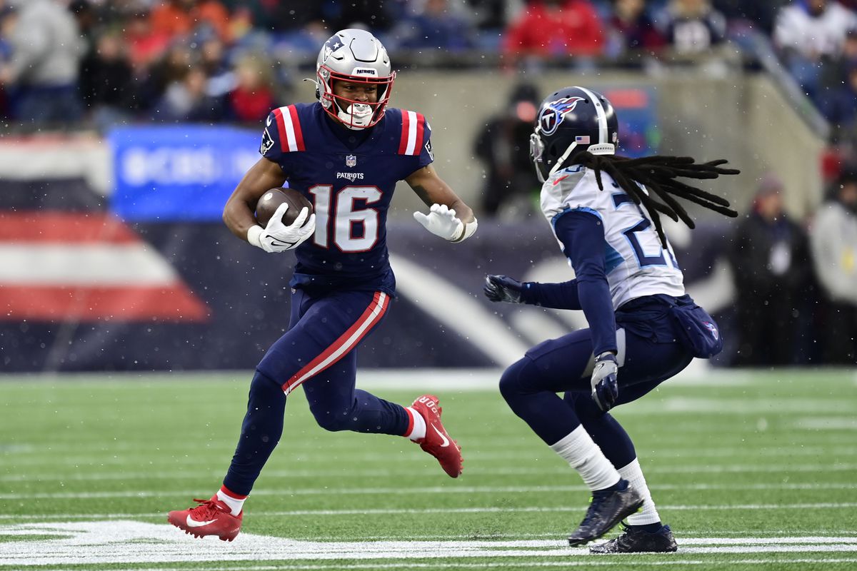 Jakobi Meyers #16 of the New England Patriots carries the ball during a game against the Tennessee Titans during a game at Gillette Stadium on November 28, 2021 in Foxborough, Massachusetts.