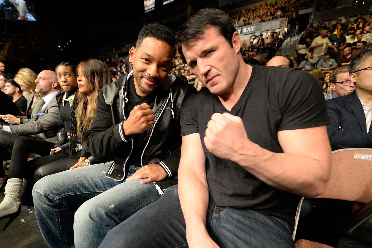Chael Sonnen poses with actor Will Smith at UFC 170 in 2014. 